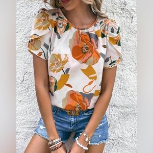 Short sleeves floral blouse. L. Never used.